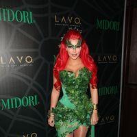 Kim Kardashian hosts the Midori Melon Green Halloween Party
